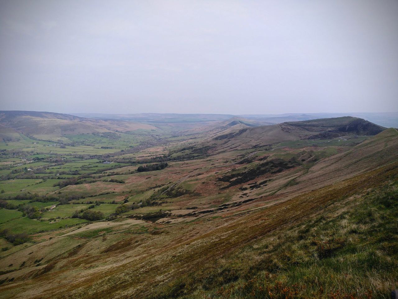 A wide-angle view East along Mam Tor and other hills to the south of Edale in the Peak District